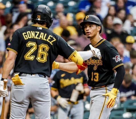 Pittsburgh Pirates catcher Endy Rodriguez (R) celebrates wtih Pittsburgh Pirates center fielder Jake Mangum after hitting a home run in the fifth inning of the MLB, Baseball Herren, USA game between the Pittsburgh Pirates and the Milwaukee Brewers at American Family Field in Milwaukee, Wisconsin on Tuesday, August 4, 2026.  MIL20260804822 TANNENxMAURY