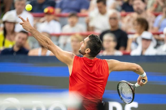 MONTREAL, QC - AUGUST 04: Marin Cilic from Croatia serves against Frances Tiafoe from USA during their singles second round match on day three of the ATP, Tennis Herren 1000 National Bank Open presented by Rogers at Stade IGA on August 4, 2026 in Montreal, Quebec, Canada. (Photo by Vincent Ethier Icon Sportswire) TENNIS: AUG 04 National Bank Open EDITORIAL USE ONLY Icon270804062