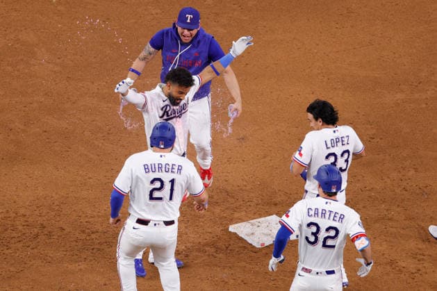August 4, 2026, Arlington, Texas, USA: Texas Rangers third baseman EZEQUIEL DURAN (20) gets a drink shower after hitting the walk-off winner in a baseball game, Tuesday, Aug. 4, 2026, in Arlington, Texas. Arlington USA - ZUMAa325 20260804_zsa_a325_006 Copyright: xDavidxBalleringxIix