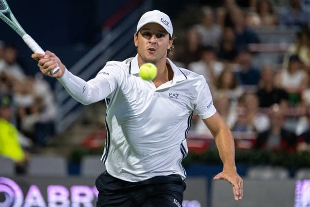 MONTREAL, QC - AUGUST 04: Luciano Darderi from Italia returns the ball against Gabriel Diallo from Canada from Italia during their singles second round match on day three of the ATP, Tennis Herren 1000 National Bank Open presented by Rogers at Stade IGA on August 4, 2026 in Montreal, Quebec, Canada. (Photo by Vincent Ethier Icon Sportswire) TENNIS: AUG 04 National Bank Open EDITORIAL USE ONLY Icon270804121