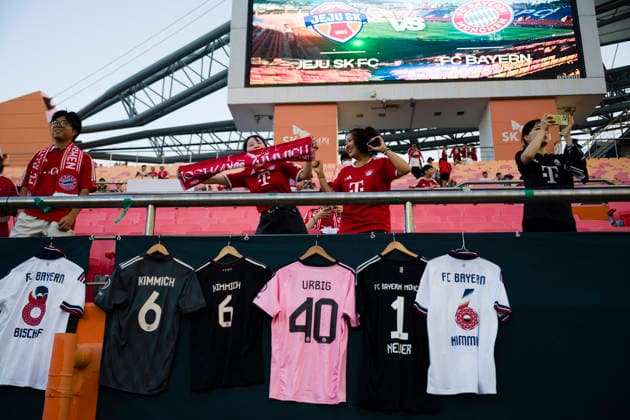 August 4, 2026, Seogwipo, Jeju, South Korea: FC Bayern Munich fans hang jerseys and cheer before an exhibition match between BundesligaÃ¢â‚¬â ¢s FC Bayern Munich and K League 1Ã¢â‚¬â ¢s Jeju SK FC, during the Audi Football Summit 2026 on Tuesday, Aug. 4, 2026 at the Jeju World Cup Stadium in Seogwipo, South Korea. Seogwipo South Korea - ZUMAh163 20260804_znp_h163_010 Copyright: xJintakxHanx