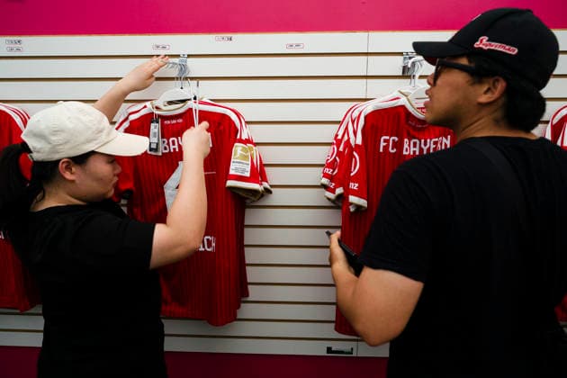 August 4, 2026, Seogwipo, Jeju, South Korea: Fans purchase FC Bayern Munich merchandise before an exhibition match between BundesligaÃ¢â‚¬â ¢s FC Bayern Munich and K League 1Ã¢â‚¬â ¢s Jeju SK FC, during the Audi Football Summit 2026 on Tuesday, Aug. 4, 2026 at the Jeju World Cup Stadium in Seogwipo, South Korea. FC Bayern Munich 2:1 Jeju SK FC Exhibition  - ZUMAh163 20260804_znp_h163_002 Copyright: xJintakxHanx