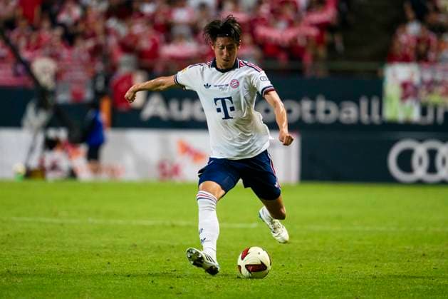 August 4, 2026, Seogwipo, Jeju, South Korea: FC Bayern Munich defender HIROKI ITO (21) dribbles the ball in an exhibition match between BundesligaÃ¢â‚¬â ¢s FC Bayern Munich and K League 1Ã¢â‚¬â ¢s Jeju SK FC, during the Audi Football Summit 2026 on Tuesday, Aug. 4, 2026 at the Jeju World Cup Stadium in Seogwipo, South Korea. Seogwipo South Korea - ZUMAh163 20260804_znp_h163_027 Copyright: xJintakxHanx
