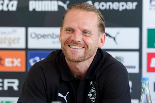 Trainer Eugen Polanski (Borussia Moenchengladbach) beantwortet bei der Pressekonferenz die Fragen der Journalisten waehrend des Trainingslagers von Borussia Moenchengladbach, Stadion Birkenmoos am 05. August 2026 in Rottach-Egern, Deutschland. (Foto von Marco Steinbrenner DeFodi Images) +++ Trainer Eugen Polanski (Borussia Moenchengladbach) answers journalists™ questions at the press conference, PK, Pressekonferenz during the Borussia Moenchengladbach Training camp at Stadion Birkenmoos on August 5, 2026 in Rottach-Egern, Germany. (Photo by Marco Steinbrenner DeFodi Images) (Photo by Marco Steinbrenner DeFodi Images) - *** Coach Eugen Polanski of Borussia Mönchengladbach answers journalists questions at a press conference during Borussia Mönchengladbach s training camp, Birkenmoos Stadium on August 5, 2026, in Rottach Egern, Germany. Photo by Marco Steinbrenner, DeFodi Images. Coach Eugen Polanski of Borussia Mönchengladbach answers journalists’ questions at the press conference during the Borussia Mönchengladbach training camp at Birkenmoos Stadium on August 5, 2026 in Rottach-Egern, Germany. Photo by Marco Steinbrenner, DeFodi Images. Photo by Marco Steinbrenner, DeFodi Images.