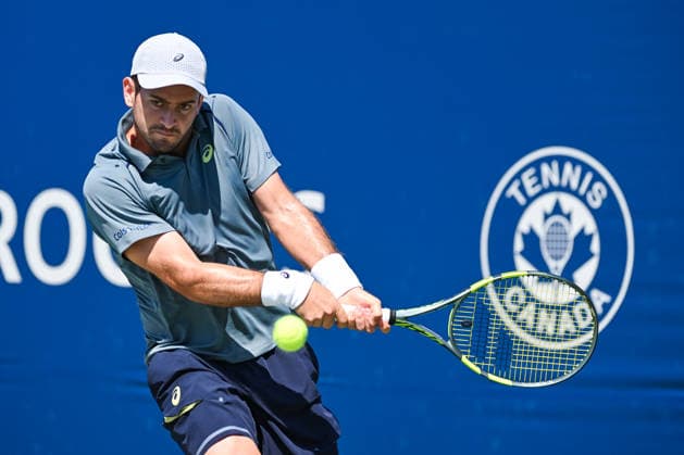 MONTREAL, QC - AUGUST 05: Nicolas Mejia (COL) returns the ball during a second round match at National Bank Open on August 05, 2026 at IGA Stadium in Montreal, QC (Photo by David Kirouac Icon Sportswire) TENNIS: AUG 05 National Bank Open EDITORIAL USE ONLY Icon26080500126
