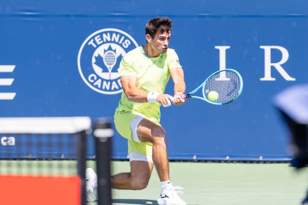 August 5, 2026, Montreal, Quebec, Canada: MARIANO NAVONE from Argentina backhand in match against Valentin Vacherot (14) from France in second round at Canadian Open at IGA stadium in Montreal, Quebec, Canada on 2026-08-05 Montreal Canada - ZUMAl189 20260805_zsp_l189_003 Copyright: xYannickxLegarex
