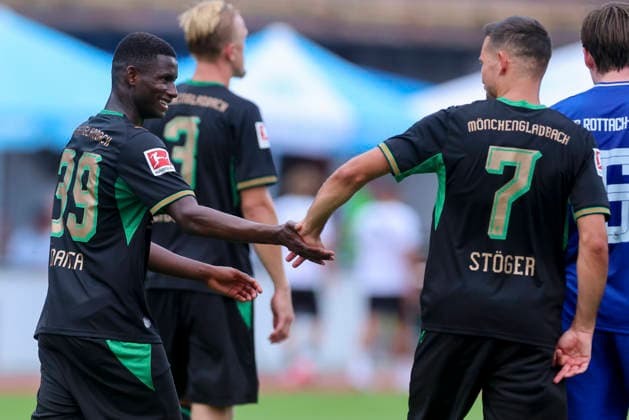 Iaia Manco Danfa (Borussia Moenchengladbach) und Kevin Stoeger (Borussia Moenchengladbach) jubeln waehrend des Freundschaftsspiels zwischen dem FC Rottach-Egern und Borussia Moenchengladbach, Stadion Birkenmoos am 05. August 2026 in Rottach-Egern, Deutschland. (Foto von Marco Steinbrenner DeFodi Images) +++ Iaia Manco Danfa (Borussia Moenchengladbach) und Kevin Stoeger (Borussia Moenchengladbach) cheer during the Friendly match between FC Rottach-Egern and Borussia Moenchengladbach at Stadion Birkenmoos on August 5, 2026 in Rottach-Egern, Germany. (Photo by Marco Steinbrenner DeFodi Images) (Photo by Marco Steinbrenner DeFodi Images) - *** Iaia Manco Danfa of Borussia Mönchengladbach and Kevin Stoeger of Borussia Mönchengladbach celebrate during the friendly match between FC Rottach Egern and Borussia Mönchengladbach at Birkenmoos Stadium on August 5, 2026, in Rottach Egern, Germany Photo by Marco Steinbrenner DeFodi Images Iaia Manco Danfa of Borussia Mönchengladbach and Kevin Stoeger of Borussia Mönchengladbach cheer during the friendly match between FC Rottach Egern and Borussia Mönchengladbach at Stadion Birkenmoos on August 5, 2026 in Rottach Egern, Germany Photo by Marco Steinbrenner, DeFodi Images Photo by Marco Steinbrenner, DeFodi Images
