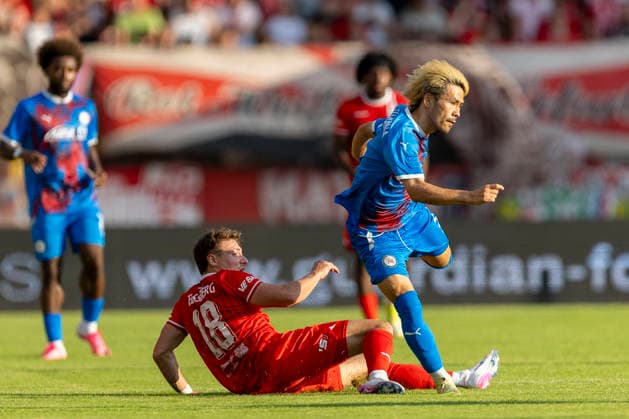 GER, Erfurt, Fussball, Regionalliga Nordost, 3. Spieltag, FC Rot-Weiss Erfurt vs. Tasmania Berlin im Bild v.l.: Robbie Felßberg (FC Rot-Weiß Erfurt 18), Rintaro Yajima (Tasmania Berlin 05), Zweikampf 05.08.2026, Steigerwaldstadion Erfurt DFB REGULATIONS PROHIBIT ANY USE OF PHOTOGRAPHS AS IMAGE SEQUENCES AND OR QUASI-VIDEO, *** GER, Erfurt, Soccer, Northeast Regional League, Matchday 3, FC Rot Weiss Erfurt vs. Tasmania Berlin (pictured, from left): Robbie Felßberg (FC Rot Weiss Erfurt 18), Rintaro Yajima (Tasmania Berlin 05), tackle on August 5, 2026, Steigerwaldstadion, Erfurt. DFB regulations prohibit any use of photographs as image sequences and or quasi-video, Copyright: HMBxMedia PaulxFritz