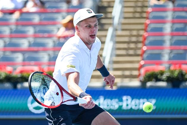 MONTREAL, QC - AUGUST 05: Jenson Brooksby (USA) returns the ball during a second round match at National Bank Open on August 05, 2026 at IGA Stadium in Montreal, QC (Photo by David Kirouac Icon Sportswire) TENNIS: AUG 05 National Bank Open EDITORIAL USE ONLY Icon26080503626