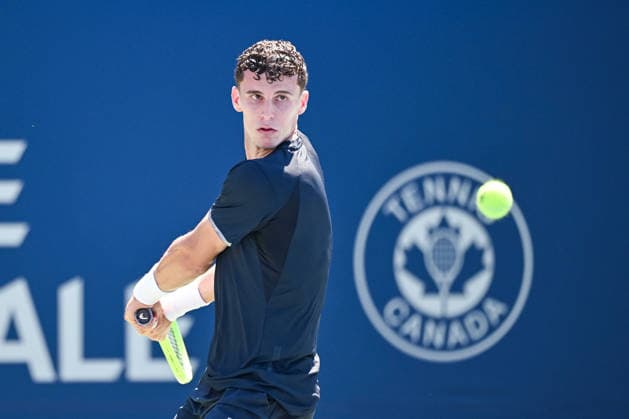 MONTREAL, QC - AUGUST 05: Juan Manuel Cerundolo (ARG) returns the ball during a second round match at National Bank Open on August 05, 2026 at IGA Stadium in Montreal, QC (Photo by David Kirouac Icon Sportswire) TENNIS: AUG 05 National Bank Open EDITORIAL USE ONLY Icon26080506026