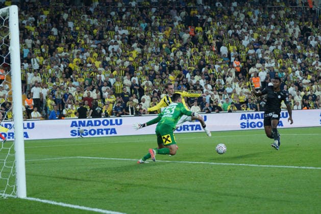 August 5, 2026, Kadikoy, Istanbul, Turkey: Kerem Akturkoglu (back) of Fenerbahce in action against Daniil Khudykov (front) of Sturm Graz during the UEFA Champions League third qualifying round match between Fenerbahce and Sturm Graz at the Chobani Stadium, Fenerbahce Sukru Saracoglu Sports Complex in Istanbul, Turkey, on August 5, 2026. UEFA Champions League Third Qualifying Round: Fenerbahce Vs Sturm Graz  - ZUMAu194 20260805_zip_u194_011 Copyright: xTolgaxUluturkx