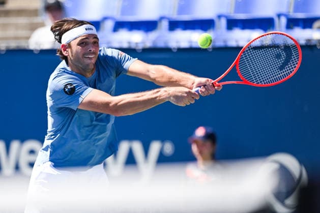 MONTREAL, QC - AUGUST 05: Taylor Fritz (USA) returns the ball during a second round match at National Bank Open on August 05, 2026 at IGA Stadium in Montreal, QC (Photo by David Kirouac Icon Sportswire) TENNIS: AUG 05 National Bank Open EDITORIAL USE ONLY Icon26080507826