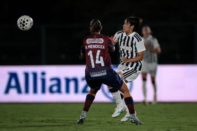 Biella, Italy, 5th August 2026. Nuria Mendoza of SCU Torreense challenges Remina Chiba of Juventus during the Juventus Women vs SCU Torreense UEFA Womens Champions League 2nd Qualifiying Round Semi Final match at Stadio Vittorio Pozzo, Biella. Picture credit should read: Jonathan Moscrop Sportimage EDITORIAL USE ONLY. No use with unauthorised audio, video, data, fixture lists, club league logos or live services. Online in-match use limited to 120 images, no video emulation. No use in betting, games or single club league player publications. SPI_054_JM_JUVE_TORREENSE_UWCL SPI-4875-0056