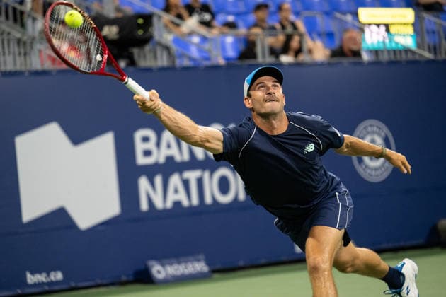 MONTREAL, QC - AUGUST 05: Tommy Paul from USA returns the ball against Valentin Royer from France during their singles second round match on day three of the ATP, Tennis Herren 1000 National Bank Open presented by Rogers at Stade IGA on August 5, 2026 in Montreal, Quebec, Canada.(Photo by Vincent Ethier Icon Sportswire) TENNIS: AUG 05 National Bank Open EDITORIAL USE ONLY Icon2608055258