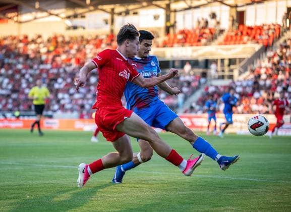 FUSSBALL REGIONALLIGA NORDOST - SAISON 2026-2027 - 3. SPIELTAG FC ROT WEISS ERFURT - SV TASMANIA BERLIN ** NUR FÜR REDAKTIONELLE ZWECKE ** EDITORIAL USE ONLY **<p>05 08 2026-Erfurt: Fussball Regionalliga Nordost 3. Spieltag Saison 2026-2027 Steigerwaldstadion FC Rot Weiss Erfurt - SV Tasmania Berlin im Foto: Artur Andreichyk 77 (FC Rot Weiss Erfurt) im Zweikampf mit Youssef Labbouz 3 (SV Tasmania Berlin) ( Deutschland Thueringen Erfurt Copyright: SaschaxFromm *** SOCCER REGIONAL LEAGUE NORTHEAST 2026–2027 SEASON, MATCHDAY 3: FC ROT WEISS ERFURT vs. SV TASMANIA BERLIN ** FOR EDITORIAL PURPOSES ONLY ** EDITORIAL USE ONLY ** p August 5, 2026 Erfurt Soccer Regional League Northeast Matchday 3, 2026–2027 Season, Steigerwaldstadion: FC Rot Weiss Erfurt vs. SV Tasmania Berlin. Photo by Artur Andreichyk. No. 77 FC Rot Weiss Erfurt in a tackle with Youssef Labbouz 3 SV Tasmania Berlin Germany Thuringia Erfurt Copyright SaschaxFromm Copyright: SaschaxFromm doc871c37b6c8xu6xdvt1z ,EDITORIAL USE ONLY