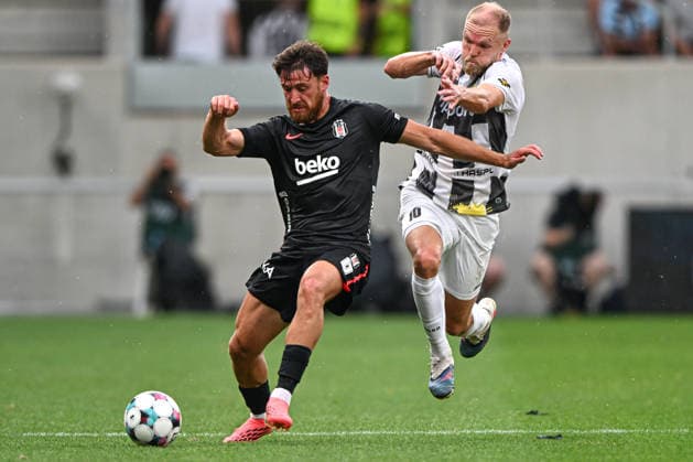 From left Salih Ozcan of Besiktas and Mick van Buren of Hradec Kralove in action during the Football European League 3rd qualifying round, 1st leg match FC Hradec Kralove vs Besiktas Istanbul on August 6, 2026, in Hradec Kralove, Czech Republic. (CTKxPhoto DavidxTanecek) CTKPhotoP2026080607353  CTKPhotoP2026080607353