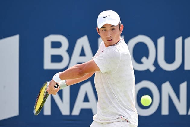 MONTREAL, QC - AUGUST 06: Juncheng Shang (CHN) returns the ball during a third round match at National Bank Open on August 06, 2026 at IGA Stadium in Montreal, QC (Photo by David Kirouac Icon Sportswire) TENNIS: AUG 06 National Bank Open EDITORIAL USE ONLY Icon26080600326
