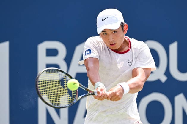 MONTREAL, QC - AUGUST 06: Juncheng Shang (CHN) returns the ball during a third round match at National Bank Open on August 06, 2026 at IGA Stadium in Montreal, QC (Photo by David Kirouac Icon Sportswire) TENNIS: AUG 06 National Bank Open EDITORIAL USE ONLY Icon26080600426