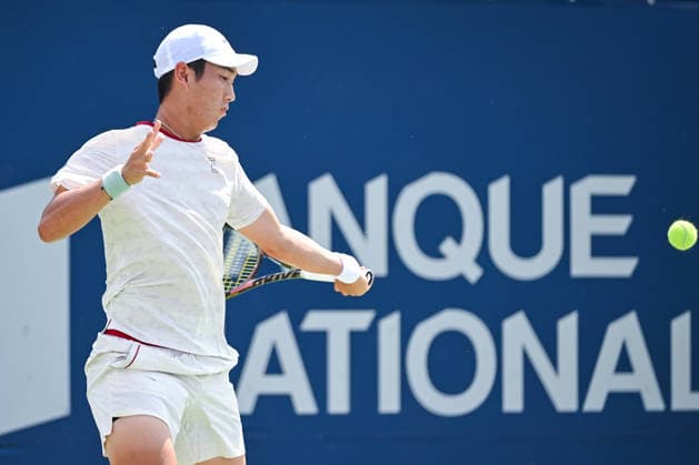MONTREAL, QC - AUGUST 06: Juncheng Shang (CHN) returns the ball during a third round match at National Bank Open on August 06, 2026 at IGA Stadium in Montreal, QC (Photo by David Kirouac Icon Sportswire) TENNIS: AUG 06 National Bank Open EDITORIAL USE ONLY Icon26080600526