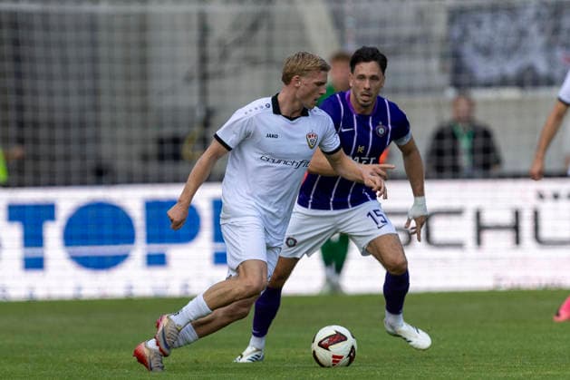 GER, Aue, Fussball, Regionalliga Nordost, 3. Spieltag, FC Erzgebirge Aue vs. BFC Dynamo im Bild v.l.: Levin Mattmueller (BFC Dynamo 06), Marcel Baer (FC Erzgebirge Aue 15), Zweikampf 06.08.2026, EINS Erzgebirgsstadion Aue DFB REGULATIONS PROHIBIT ANY USE OF PHOTOGRAPHS AS IMAGE SEQUENCES AND OR QUASI-VIDEO, *** GER, Aue, Soccer, Northeast Regional League, Matchday 3, FC Erzgebirge Aue vs. BFC Dynamo (pictured, from left: Levin Mattmueller, BFC Dynamo 06), Marcel Baer, FC Erzgebirge Aue 15, tackle, August 6, 2026, EINS Erzgebirgsstadion Aue. DFB regulations prohibit any use of photographs as image sequences and or quasi-video, Copyright: HMBxMedia PaulxFritz