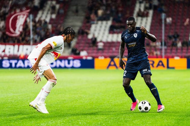SOCCER - UEFA EL, RBS vs Pafos SALZBURG,AUSTRIA,06.AUG.26 - SOCCER - UEFA Europa League, qualification, Red Bull Salzburg vs Pafos FC. Image shows Enrique Aguilar (RBS) and Ken Sema (Pafos).  GEPAxpictures xJulioxArellano
