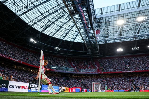 AMSTERDAM, NETHERLANDS - AUGUST 6: Mika Godts of AFC Ajax takes a corner kick during the UEFA Conference League 2026 27 third qualifying round first leg match between AFC Ajax and Shelbourne FC at the Johan Cruijff Arena on August 6, 2026 in Amsterdam, Netherlands.  Copyright: xRenexNijhuis MBxMediax