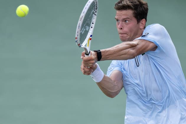 MONTREAL, QC - AUGUST 06: Alexander Blockk from Belgium returns the ball against Jiri Lehecka from Czeckia during their singles third round match on day five of the ATP, Tennis Herren 1000 National Bank Open presented by Rogers at Stade IGA on August 6, 2026 in Montreal, Quebec, Canada.(Photo by Vincent Ethier Icon Sportswire) TENNIS: AUG 06 National Bank Open EDITORIAL USE ONLY Icon2608060248