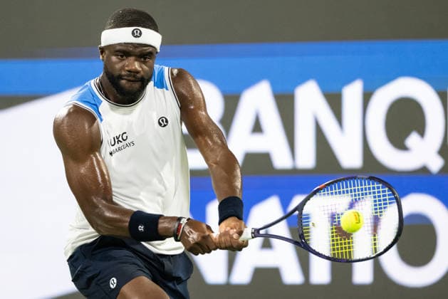 MONTREAL, QC - AUGUST 06: Frances Tiafoe from USA returns the ball against Arthur Rinderknech from France during their singles third round match on day five of the ATP, Tennis Herren 1000 National Bank Open presented by Rogers at Stade IGA on August 6, 2026 in Montreal, Quebec, Canada.(Photo by Vincent Ethier Icon Sportswire) TENNIS: AUG 06 National Bank Open EDITORIAL USE ONLY Icon2608068996