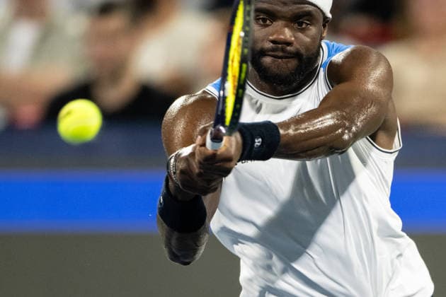 MONTREAL, QC - AUGUST 06: Frances Tiafoe from USA returns the ball against Arthur Rinderknech from France during their singles third round match on day five of the ATP, Tennis Herren 1000 National Bank Open presented by Rogers at Stade IGA on August 6, 2026 in Montreal, Quebec, Canada.(Photo by Vincent Ethier Icon Sportswire) TENNIS: AUG 06 National Bank Open EDITORIAL USE ONLY Icon2608069192