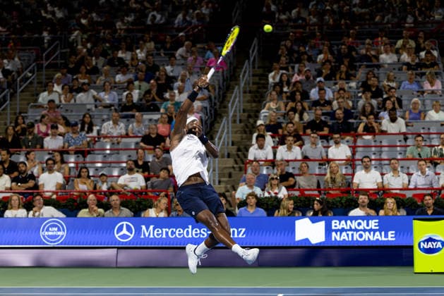 August 6, 2026, Montreal, Quebec, Canada: FRANCES TIAFOE (15) from USA smash in match against Arthur Rinderknech from France in third round at Canadian Open at IGA stadium in Montreal, Quebec, Canada on 2026-08-06 Montreal Canada - ZUMAl189 20260806_zsp_l189_152 Copyright: xYannickxLegarex