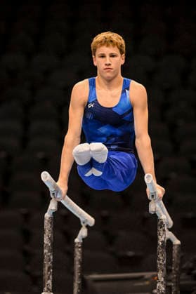 Gymnastics: Gymnastics: Xfinity US Gymnastics Championships Abe Stewart of Momentum competes on parrellel bars exercise in the junior division of the Xfinity USA Gymnastics Championship at the Mortgage Matchup Center in Phoenix, Arizona, Thursday, August 6, 2026. (Thomas Fernandez Image of . Phoenix Arizona United States EDITORIAL USE ONLY Copyright: xx ThomasxFernandezx iosphotos417355