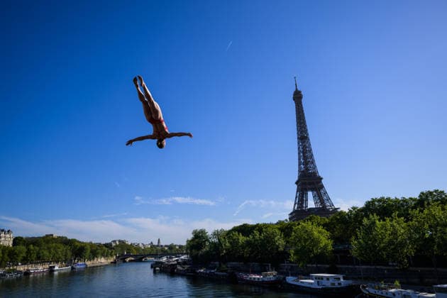 260807 Annika Bornebusch of Denmark dives from the 20 meter platform with the Eiffel Tower in the background at a training session for women™s high diving during day eight of the 2026 European Aquatics Championships on August 7, 2026 in Paris. Photo: Joel Marklund BILDBYRAN kod JM JM0834 bbeng simhopp diving high diving höga hopp 2026 european aquatics championships em träning training dam *** August 7, 2026: Annika Bornebusch of Denmark dives from the 20-meter platform with the Eiffel Tower in the background during a training session for women’s high diving on the eighth day of the 2026 European Aquatics Championships on August 7, 2026 in Paris. Photo by Joel Marklund. BILDBYRAN code JM JM0834 bbeng diving high diving 2026 European Aquatics Championships training women’s  Copyright: JOELxMARKLUND BB260807JM001