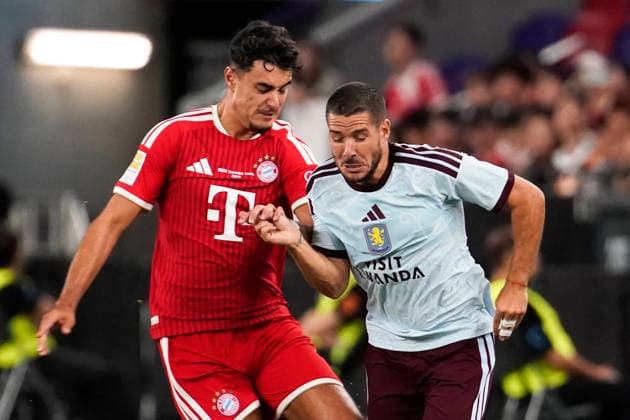 HONGKONG-SOCCER Aleksandar Pavlovic of FC Bayern Munich and Emiliano Buendia of Aston Villa during a match of FC Bayern Munich VS Aston Villa at Kai Tan Stadium during the Audi Football Summit 2026 in Hong Kong, August 7, 2026. NEXPHER Vernon Yuen HONG KONG