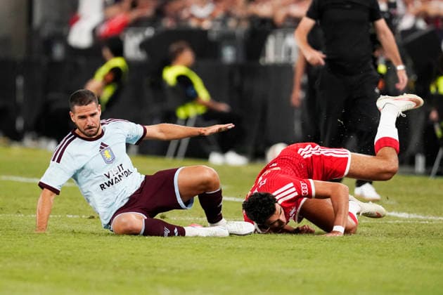 HONGKONG-SOCCER Aleksandar Pavlovic of FC Bayern Munich and Emiliano Buendia of Aston Villa during a match of FC Bayern Munich VS Aston Villa at Kai Tan Stadium during the Audi Football Summit 2026 in Hong Kong, August 7, 2026. NEXPHER Vernon Yuen HONG KONG