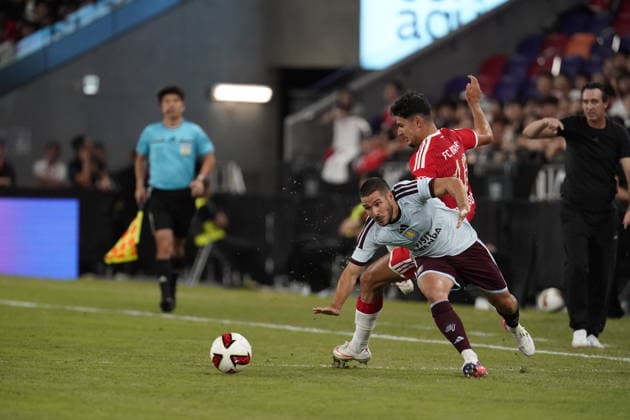HONGKONG-SOCCER Aleksandar Pavlovic of FC Bayern Munich and Emiliano Buendia of Aston Villa during a match of FC Bayern Munich VS Aston Villa at Kai Tan Stadium during the Audi Football Summit 2026 in Hong Kong, August 7, 2026. NEXPHER Vernon Yuen HONG KONG