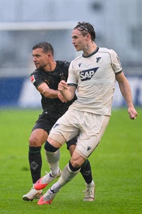 SOCCER - Hoffenheim vs Gladbach, test match SCHWAZ,AUSTRIA,07.AUG.26 - SOCCER - 1. DFL, 1. Deutsche Bundesliga, TSG Hoffenheim vs Borussia Mönchengladbach, test match. Image shows Patrick Wimmer (Hoffenheim) and Kevin Stoeger (Gladbach).  GEPAxpictures xDanielxSchoenherr