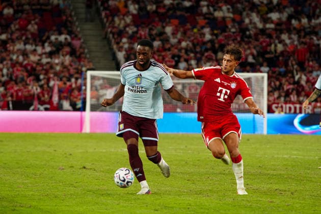 HONG KONG-SPORTS BAYERN-ASTON-VILLA Players of Bayern Munich and Aston Villa compete during the second half of their exhibition football match at the Kai Tak Stadium on August 7, 2026 in Hong Kong. Bayern Munich defeated Aston Villa 2-1, following second-half action that saw Luis Diaz score for Bayern and Victor Lindelof score a consolation goal for Villa. (Photo by Zulu Lo TMHK via Nexpher Images) Hong Kong