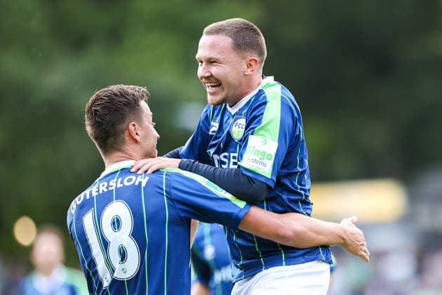 2026.08.07, xkwix, Fußball, Regionalliga West, FC Gütersloh - VfL Bochum II, Heidewaldstadion, 2.Spieltag, Saison 2026 2027: Tor zum 1:0 durch Patrik Twardzik (FC Gütersloh 18) jubel mit Phil Beckhoff (FC Gütersloh 8)DFB regulations prohibit any use of photographs as image sequences and or quasi-video. Photo: xKamilxWilkowskixPressefotoKochx Nordrhein-Westfalen Deutschland *** August 7, 2026, xkwix, Soccer, Regionalliga West, FC Gütersloh vs. VfL Bochum II, Heidewaldstadion, Matchday 2, 2026–2027 season: 1–0 goal by Patrik Twardzik (FC Gütersloh, age 18) celebrating with Phil Beckhoff (FC Gütersloh, age 8). DFB regulations prohibit any use of photographs as image sequences and or quasi-video. Photo: xKamilxWilkowskixPressefotoKochx North Rhine-Westphalia, Germany
