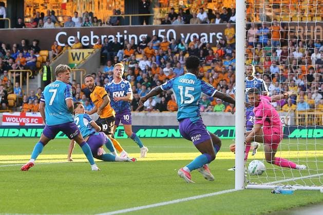 Adam Armstrong of Wolves scores their sides first goal Wolverhampton Wanderers v Port Vale, EFL Carabao Cup, First Round, Football, Molineux, Wolverhampton, UK - 07 Aug 2026Wolverhampton Molineux United Kingdom EDITORIAL USE ONLY No use with unauthorised audio, video, data, fixture lists, club league logos or live services. Online in-match use limited to 120 images, no video emulation. No use in betting, games or single club league player publications.  Copyright: xPhilxOldham Shutterstockx 17050839ab