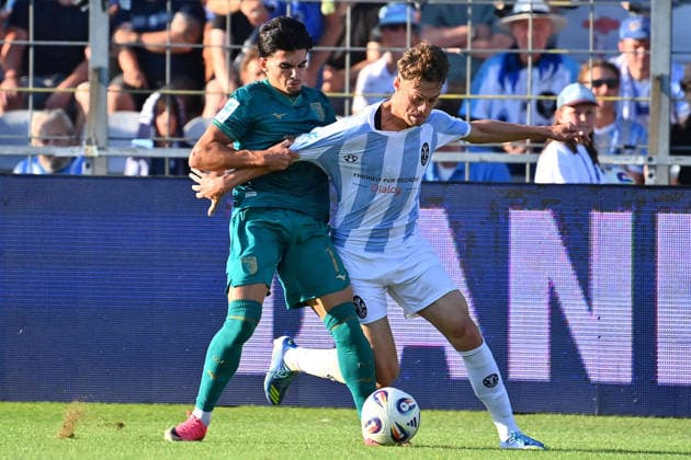 Emre ERDOGAN (1860 Muenchen), Aktion,Zweikampf gegen Aris Isa MALAJ (A), Fussball Regionalliga Bayern Saison 2026 2027,26 27 3.Spieltag TSV 1860 Muenchen - FC Augsburg II am 07.08.2026 in Muenchen GRUENWALDER STADION. *** Emre ERDOGAN, 1860 Munich, Action, Tackle against Aris Isa MALAJ A, Bavarian Regional League Soccer, 2026–2027 season, Matchday 26–27, Game 3: TSV 1860 Munich vs. FC Augsburg II on August 7, 2026, at Grünwalder Stadion in Munich