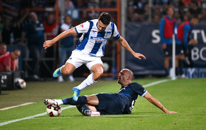 Bochum, Germany, 2. Bundesliga, Matchday 1, Vonovia Ruhrstadion Bochum, VfL Bochum vs Hertha BSC Berlin; Philipp Hofmann (BOC), Josip Brekalo (HBB). Action *** Bochum, Germany, 2. Bundesliga, Matchday 1, Vonovia Ruhrstadion Bochum, VfL Bochum vs. Hertha BSC Berlin Philipp Hofmann (BOC), Josip Brekalo (HBB) Action