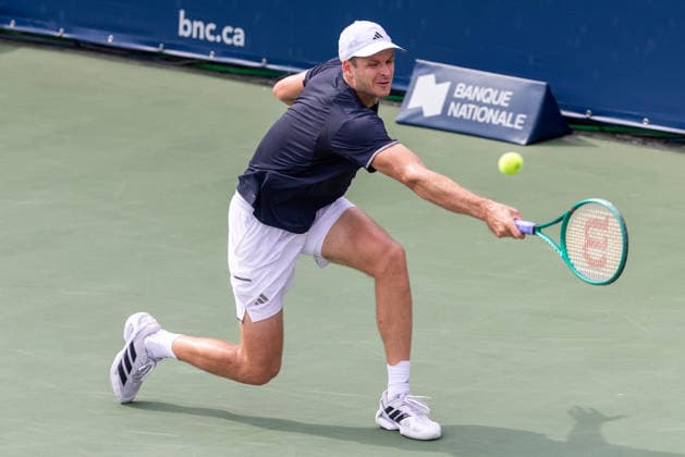 August 7, 2026, Montreal, Quebec, Canada: HUBERT HURKACS from Poland backhand in match against Botic Van De Zandschulp from Nederlands in third round at Canadian Open at IGA stadium in Montreal, Quebec, Canada on 2026-08-07 Montreal Canada - ZUMAl189 20260807_zsp_l189_110 Copyright: xYannickxLegarex
