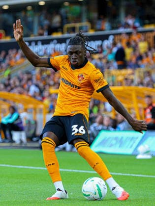 WOLVERHAMPTON, ENGLAND - August 7: Mateus Mane of Wolves crosses the ball during the Carabao Cup football match between Wolverhampton Wanderers and Port Vale at Molineux stadium on August 7 2026 in Wolverhampton, England  Copyright: xNataliexMincher SPPx Sportspressphoto_SPR202173