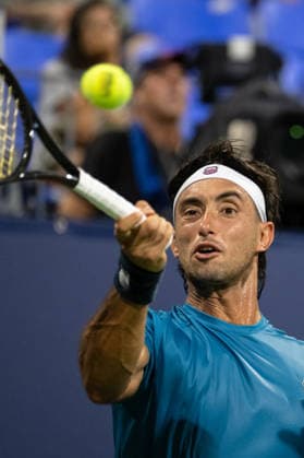 MONTREAL, QC - AUGUST 07: Thiago Agustin Tirante from Argentina returns the ball against Alexei Popyrin from Australia during their singles third round match on day six of the ATP, Tennis Herren 1000 National Bank Open presented by Rogers at Stade IGA on August 7, 2026 in Montreal, Quebec, Canada.(Photo by Vincent Ethier Icon Sportswire) TENNIS: AUG 07 National Bank Open EDITORIAL USE ONLY Icon2608073343