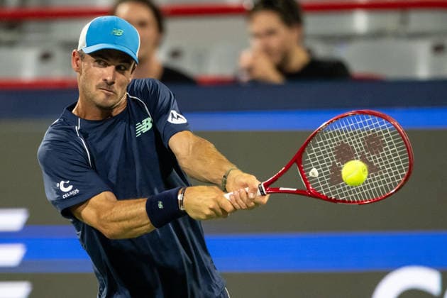 MONTREAL, QC - AUGUST 07: Tommy Paul from USA returns the ball Learner Tien from USA during their singles third round match on day six of the ATP, Tennis Herren 1000 National Bank Open presented by Rogers at Stade IGA on August 7, 2026 in Montreal, Quebec, Canada.(Photo by Vincent Ethier Icon Sportswire) TENNIS: AUG 07 National Bank Open EDITORIAL USE ONLY Icon2608074615