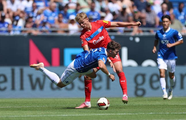 08.08.2026, Fussball 2. Bundesliga, SV Darmstadt 98 - Holstein Kiel, v.l., Noah Weißhaupt (SV Darmstadt 98), Kasper Davidsen (Holstein Kiel) DFL DFB REGULATIONS PROHIBIT ANY USE OF PHOTOGRAPHS AS IMAGE SEQUENCES AND OR QUASI-VIDEO. xdcx *** August 8, 2026, Soccer 2. Bundesliga, SV Darmstadt 98 vs. Holstein Kiel, from left: Noah Weißhaupt (SV Darmstadt 98), Kasper Davidsen (Holstein Kiel). DFL and DFB regulations prohibit any use of photographs as image sequences and or quasi-video. xdcx Copyright: HMBxMedia Claus