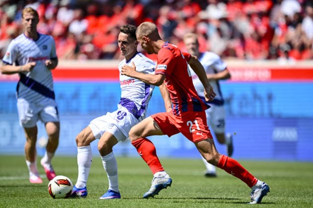Konrad Faber (VfL Osnabrueck) und Adrian Beck (1. FC Heidenheim 1846) im Zweikampf waehrend des spiels der 2. Bundesliga zwischen 1. FC Heidenheim und VfL Osnabrueck, Voith-Arena am 08. August 2026 in Heidenheim an der Brenz, Deutschland. (Foto von Harry Langer DeFodi Images) +++ Konrad Faber (VfL Osnabrueck) und Adrian Beck (1. FC Heidenheim 1846) battle for the ball during the 2nd Bundesliga match between 1. FC Heidenheim and VfL Osnabrueck at Voith-Arena on August 8, 2026 in Heidenheim an der Brenz, Germany. (Photo by Harry Langer DeFodi Images) DFB DFL REGULATIONS PROHIBIT ANY USE OF PHOTOGRAPHS AS IMAGE SEQUENCES AND OR QUASI-VIDEO. (Photo by Harry Langer DeFodi Images) DFB DFL REGULATIONS PROHIBIT ANY USE OF PHOTOGRAPHS AS IMAGE SEQUENCES AND OR QUASI-VIDEO. - *** Konrad Faber of VfL Osnabrück and Adrian Beck of 1 FC Heidenheim 1846 go head-to-head during the 2. Bundesliga match between 1 FC Heidenheim and VfL Osnabrück, at the Voith Arena on August 8, 2026, in Heidenheim an der Brenz, Germany. Photo by Harry Langer, DeFodi Images. Konrad Faber of VfL Osnabrück and Adrian Beck of 1 FC Heidenheim 1846 battle for the ball during the 2. Bundesliga match between 1 FC Heidenheim and VfL Osnabrück at Voith Arena on August 8, 2026 in Heidenheim an der Brenz, Germany. Photo by Harry Langer, DeFodi Images. DFB and DFL regulations prohibit any use of photographs as image sequences and or quasi-video. Photo by Harry Langer, DeFodi Images. DFB and DFL regulations prohibit any use of photographs as imSEQUENCES AND OR QUASI-VIDEO