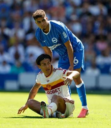 Paulo Dybala of AS Roma (on ground) and Yasin Ayari of Brighton and Hove Albion Brighton and Hove Albion v Roma, Pre Season Friendly, Football, American Express Community Stadium, Brighton, UK - 08 Aug 2026Brighton American Express Community Stadi United Kingdom EDITORIAL USE ONLY No use with unauthorised audio, video, data, fixture lists, club league logos or live services. Online in-match use limited to 120 images, no video emulation. No use in betting, games or single club league player publications.  Copyright: xMattxImpey Shutterstockx 17050873g