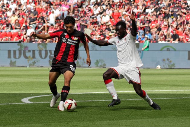 08.08.2026, xgrfx, Fussball Testspiel, Bayer Leverkusen - FC Sevilla v.l. Ibrahim Maza (Bayer Leverkusen), Arouna Sangante (FC Sevilla) (DFL DFB REGULATIONS PROHIBIT ANY USE OF PHOTOGRAPHS as IMAGE SEQUENCES and or QUASI-VIDEO) Leverkuseb *** August 8, 2026, xgrfx, Soccer Friendly Match, Bayer Leverkusen vs. FC Sevilla, featuring Ibrahim Maza of Bayer Leverkusen, Arouna Sangante, FC Sevilla. DFL and DFB regulations prohibit any use of photographs as image sequences and or quasi-video. Leverkusen