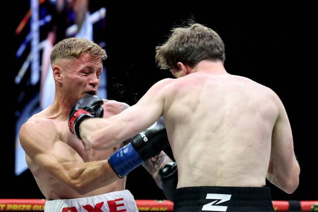 Zuffa Boxing 10, 3Arena, Dublin 8 8 2026 Sam Hickey lands a punch on Brad Axe Sam Hickey lands a punch on Brad Axe 8 8 2026  Copyright: xx NE1L5261